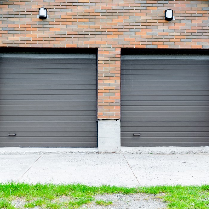 Experienced technicians installing energy-efficient insulated garage doors in Goose Creek